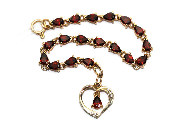 Золотой браслет с&nbsp;фианитом и&nbsp;гранатом