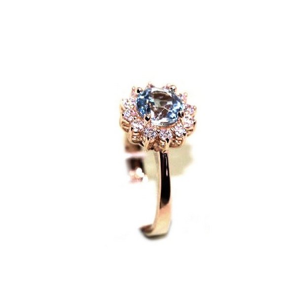 Золотое кольцо с&nbsp;топазом и&nbsp;фианитом