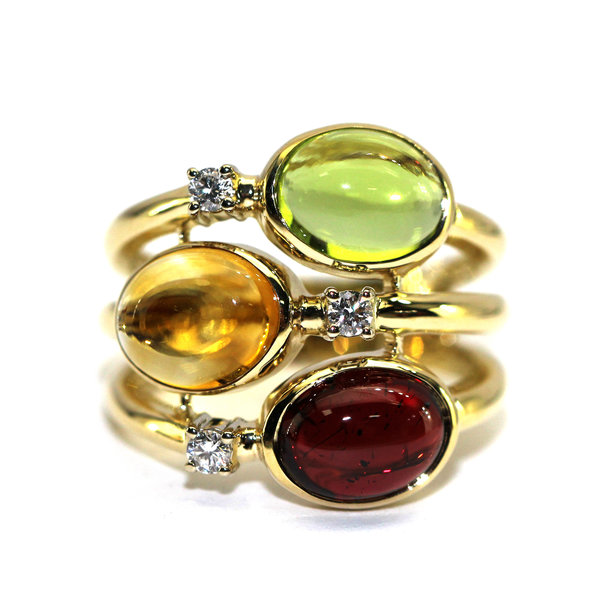 Золотое кольцо с бриллиантом, цитрином, хризолитом и гранатом