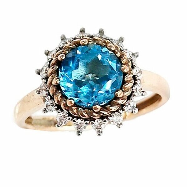 Золотое кольцо с&nbsp;фианитом и&nbsp;топазом