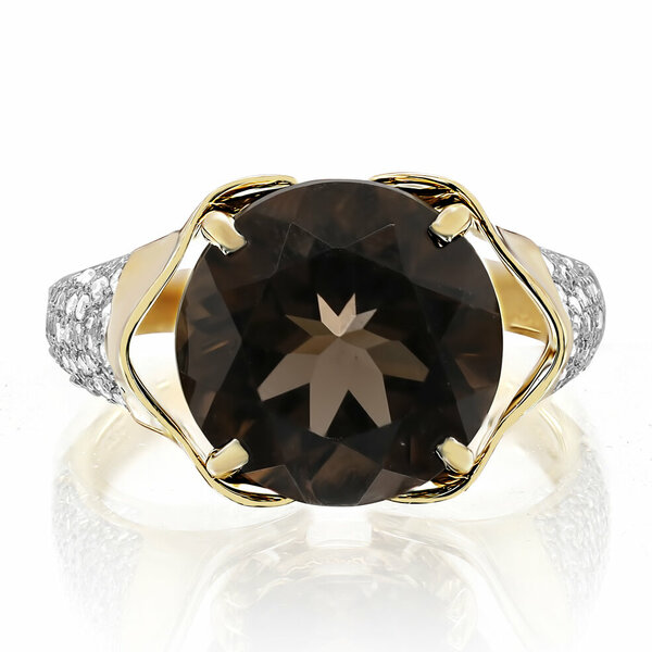 Золотое кольцо с бриллиантом и топазом